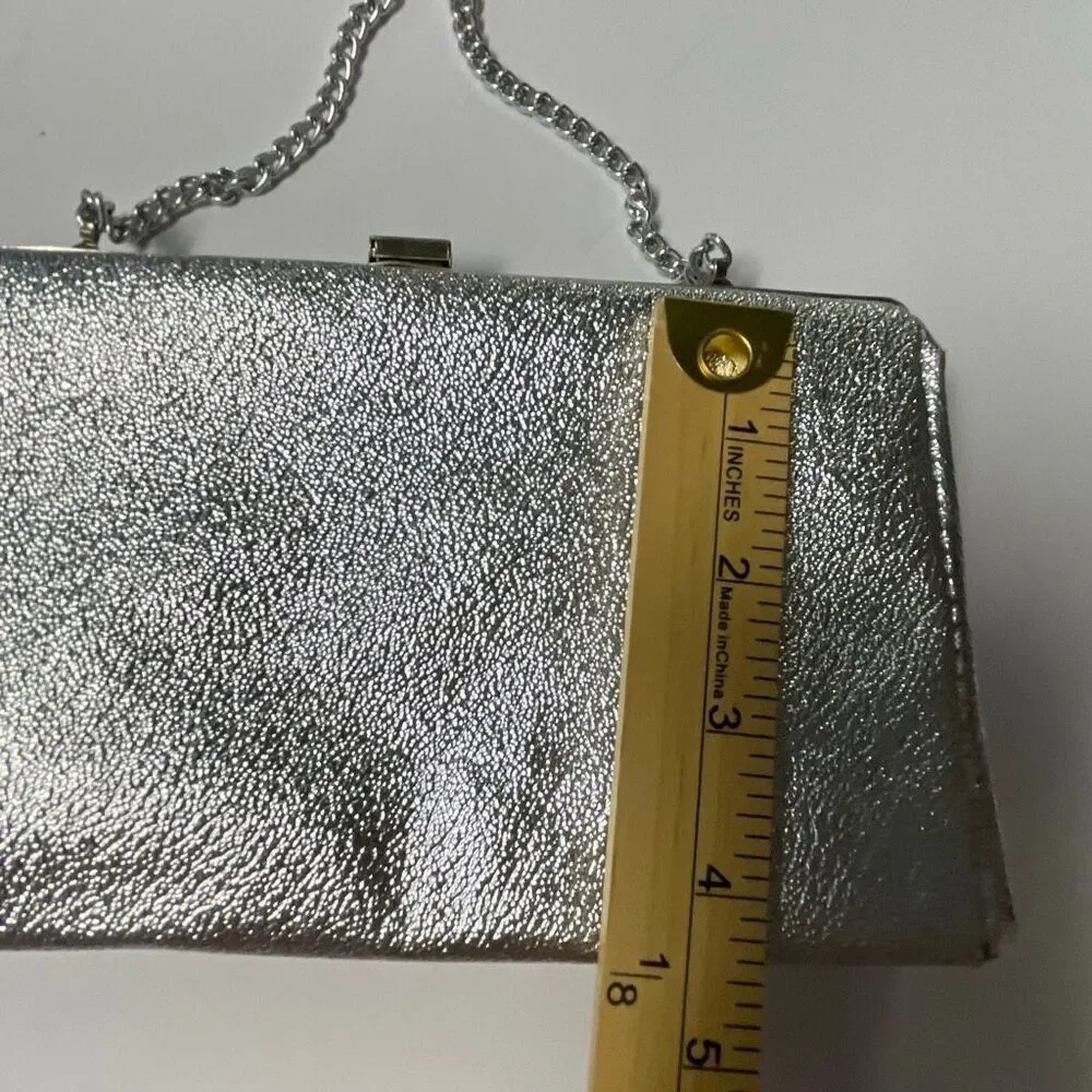 Vintage silver clutch with chain handle. Silver metallic